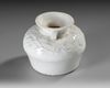 A CHINESE DEHUA GLAZED MINIATURE VASE, MING DYNASTY (1368-1644)