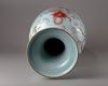 A CHINESE BLUE-GROUND FAMILLE ROSE 'DRAGONS' VASE