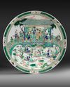 A LARGE CHINESE CONICAL SHAPED FAMILLE VERTE CHARGER, QING DYNASTY (1644-1911)18TH CENTURY