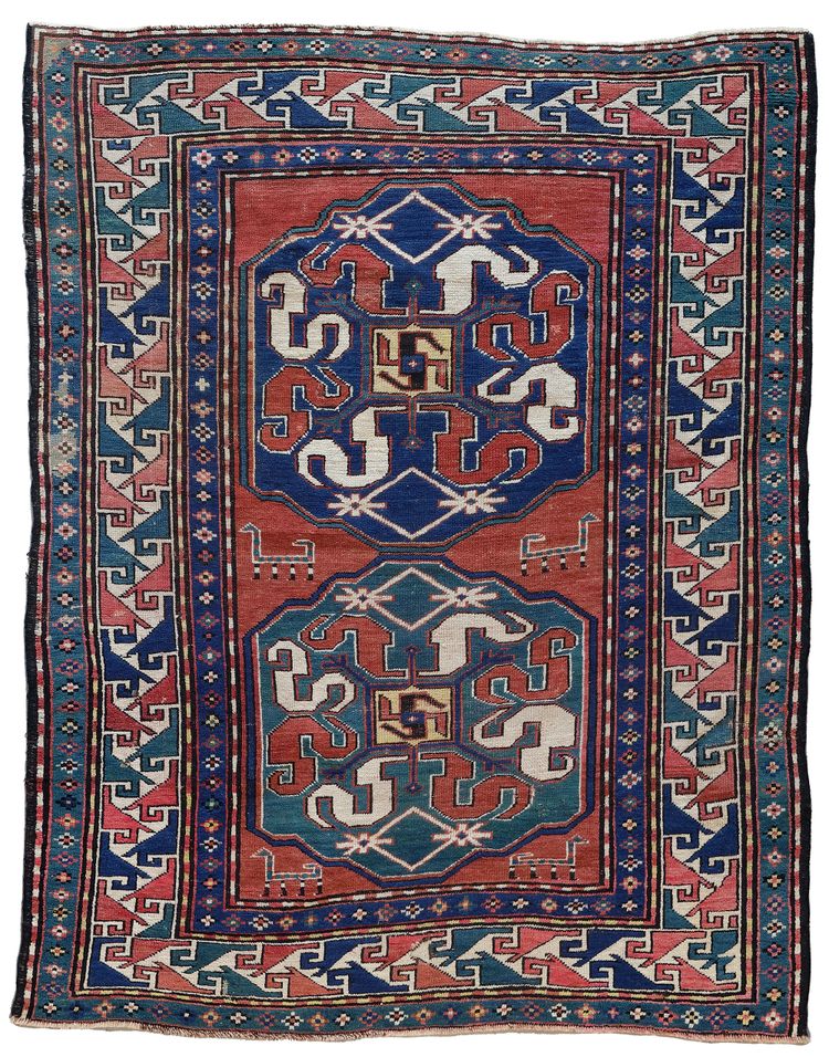 A CAUCASIAN CLOUDBAND KAZAK RUG (CHONDORESK),19TH CENTURY