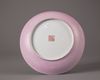 A famille-rose pink-ground sgraffiato dish