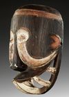 AN AFRICAN MASK, 20TH CENTURY
