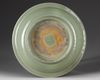 A CHINESE CELADON GLAZED DISH, POSSIBLY MING DYNASTY