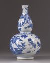 A blue and white double gourd vase