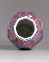 A Chinese octagonal deep red and blue jar
