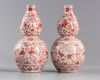 A PAIR OF  CHINESE IRON-RED DOUBLE GOURD VASES, 19TH-20TH CENTURY
