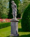 A SCULPTED LIMESTONE MODEL OF A STANDING WOMAN, SECOND HALF 20TH CENTURY