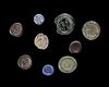 A GROUP OF NINE EARLY ISLAMIC GLASS WEIGHTS, 10TH-11TH CENTURY