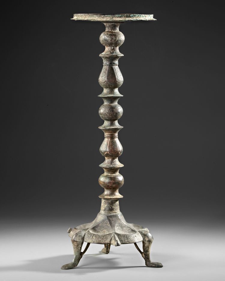 A KHORASAN COMPOSITE BRONZE LAMP STAND, PERSIA, 12TH CENTURY