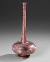 A PURPLE GLASS SPRINKLER FLASK, PERSIA OR SYRIA, 9TH–11TH CENTURY