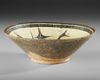AN ISLAMIC NISHAPUR CALLIGRAPHIC POTTERY BOWL, EASTERN PERSIA, 10TH CENTURY