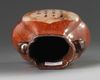A small Chinese imitation-wood hu vase