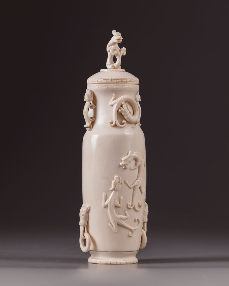 A Chinese ivory ‘chilong’ vase and cover