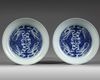 A PAIR OF CHINESE BLUE AND WHITE 'PHOENIX' DISHES