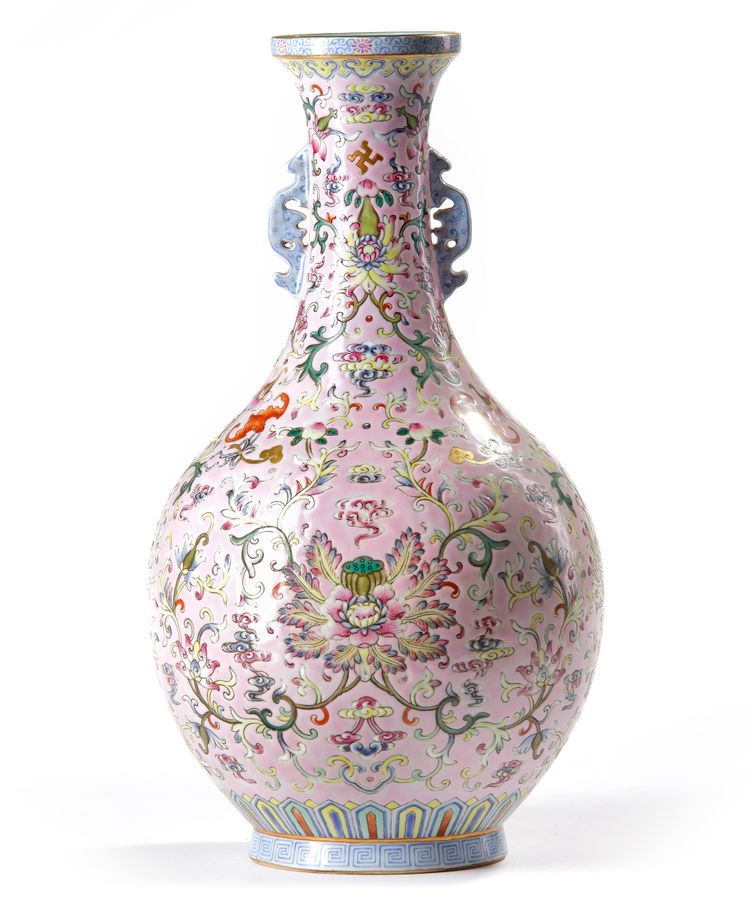 A CHINESE PINK-GROUND FAMILLE ROSE VASE