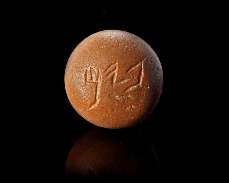 A WESTERN ASIATIC PHOENICIAN STAMP WITH ARAMAIC INSCRIPTION, CIRCA 700 - 500 B.C.