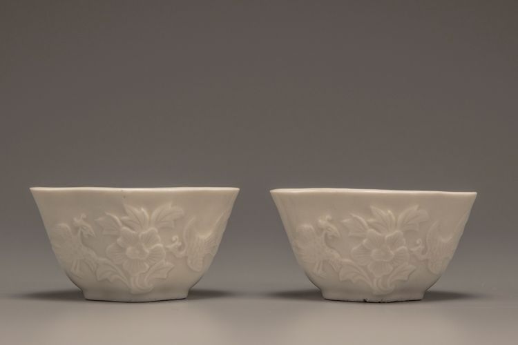 A pair of white-glazed lobed cups