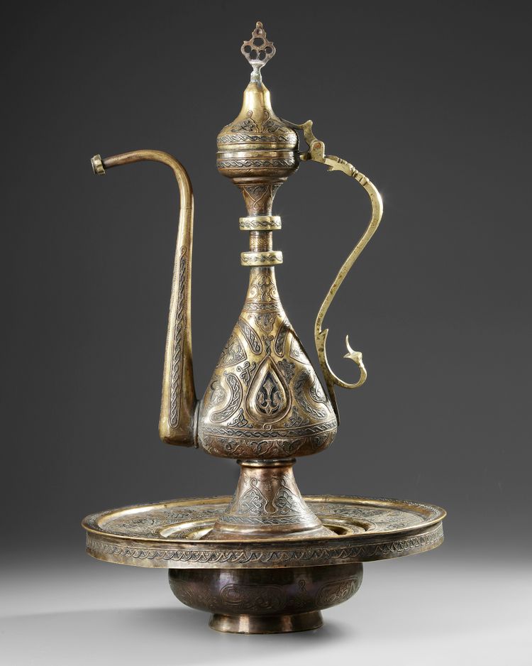 A CAIRO-WARE COPPER EWER AND BASIN,  EARLY 20TH CENTURY