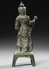 A CHINESE BRONZE FIGURE OF GUANYIN, 17TH CENTURY