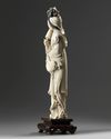 A large Chinese ivory carving of a lady holding a parasol