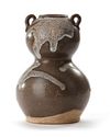 A SPLASH-GLAZED DOUBLE GOURD, TANG DYNASTY (618-907)
