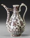 A CHINESE COPPER RED EWER, MING DYNASTY (1644-1911) OR LATER