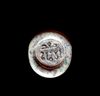 A FATIMID GLASS WEIGHT OF DIRHAM, EGYPT AL-MUSTANSIR BI-ALLAH (AH 427-487 / 1036-1094 AD)