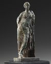 A ROMAN BRONZE STATUETTE OF APHRODITE / VENUS LEANING ON A PILLAR, CIRCA 1ST CENTURY B.C - A.D.