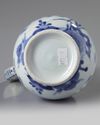 A JAPANESE BLUE AND WHITE JUG, 17TH CENTURY
