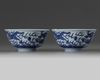 A pair of Chinese blue and white 'dragon' bowls