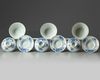 Three sets of Chinese blue and white bowls, covers and saucers