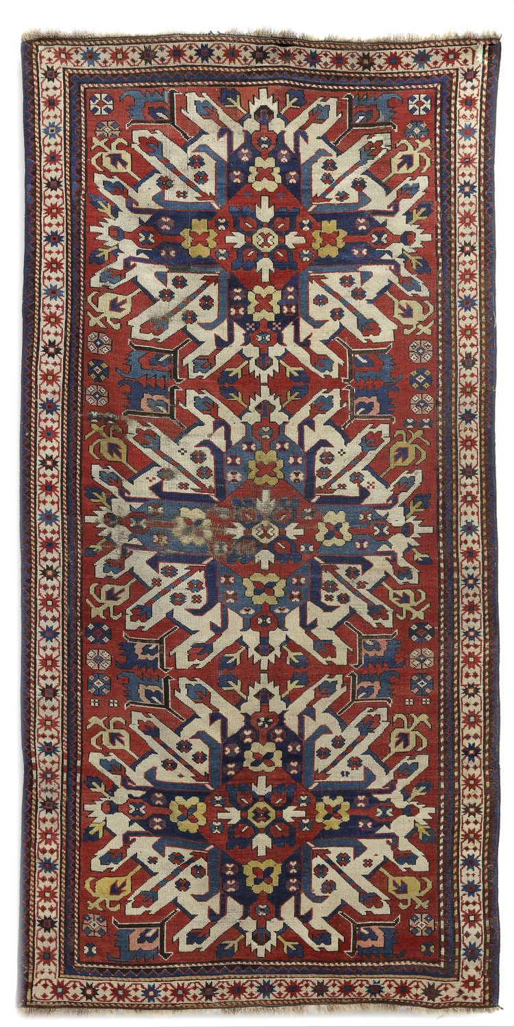 A CAUCASIAN KAZAK ADLER (CHALEBERD) RUG, 19TH CENTURY