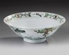 A CHINESE FAMILLE VERTE 'CRANE AND PEACH' BOWL