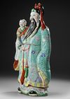 LARGE CHINESE FAMILLE ROSE FIGURE, 19TH / 20TH CENTURY