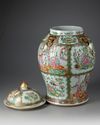 A CHINESE FAMILLE ROSE CANTON VASE WITH COVER, 19TH CENTURY
