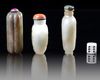 A GROUP OF THREE CHINESE JADE SNUFF BOTTLES