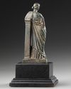 A ROMAN BRONZE STATUETTE OF APHRODITE / VENUS LEANING ON A PILLAR, CIRCA 1ST CENTURY B.C - A.D.