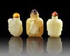 THREE CHINESE CELADON JADE SNUFF BOTTLES