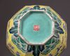 A Chinese yellow-ground octagonal famille rose 'dragon' bottle vase