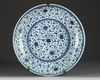 A Chinese blue and white 'floral scroll' charger