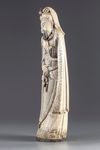 A CHINESE IVORY FIGURE OF GUANDI