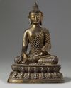A Chinese bronze figure of buddha