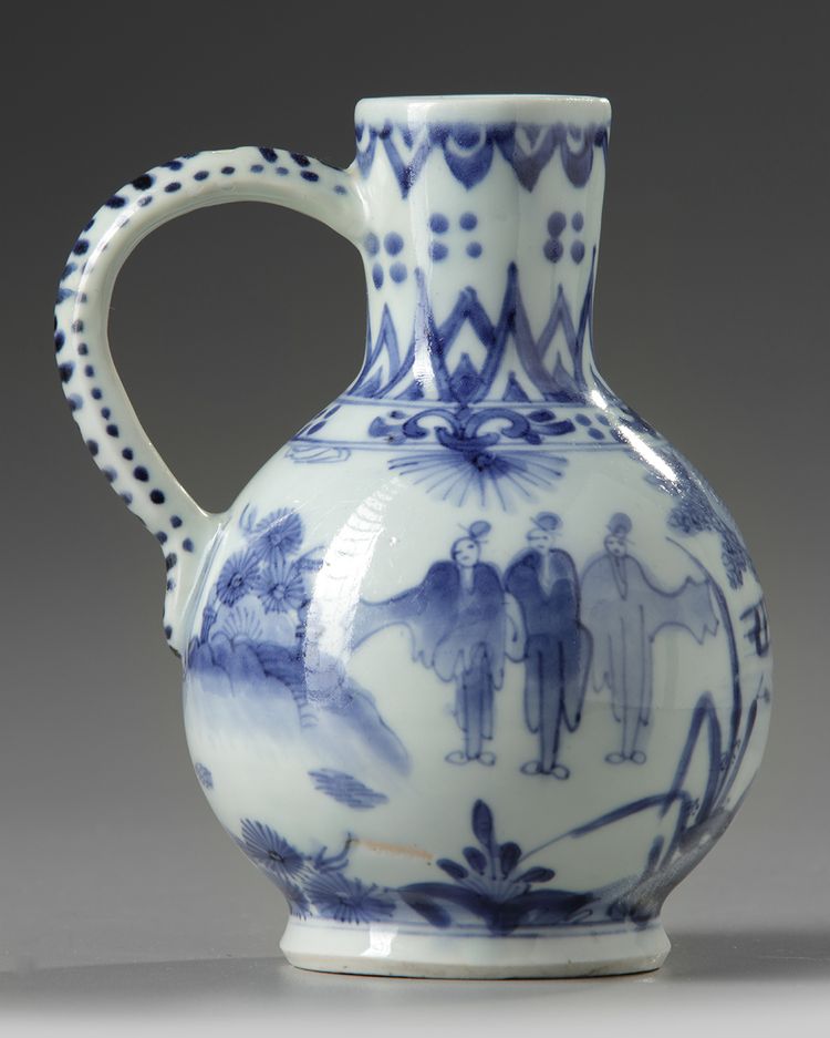 A JAPANESE BLUE AND WHITE JUG, 17TH CENTURY