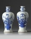 A pair of Chinese blue and white 'flower basket' vases