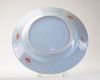 A CHINESE FAMILLE ROSE CHARGER