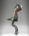 A BRONZE FINIAL IN THE FORM OF HARE, POSSIBLY FATIMID, 11TH-13TH CENTURY