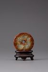 A celadon and russet jade bi