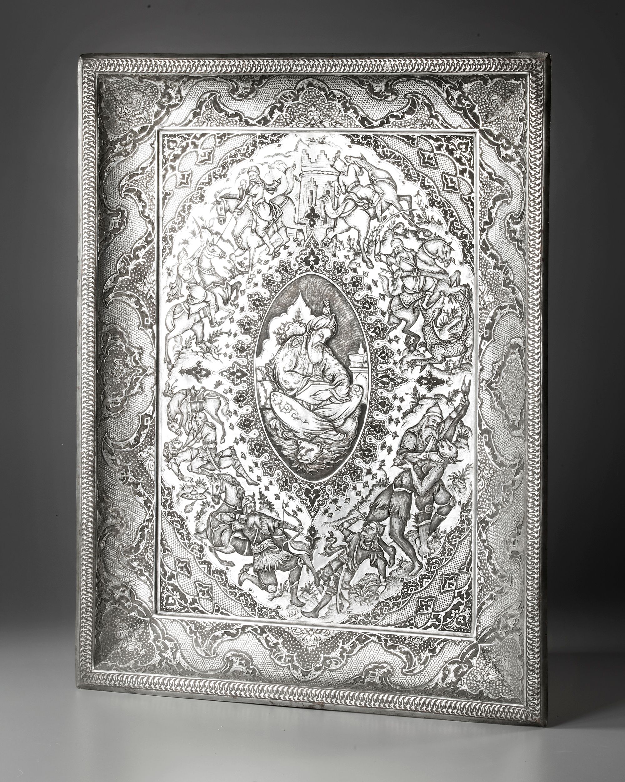 A PERSIAN TINNED AND ENGRAVED TABLEAU SIGNED BY MASTER MAHDI
