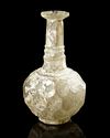 A WHEEL-CUT CLEAR GLASS BOTTLE PERSIA, CIRCA 9TH-10TH CENTURY