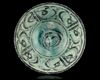 A KASHAN TURQUOISE AND BLACK POTTERY BOWL, PERSIA, 12TH-13TH CENTURY